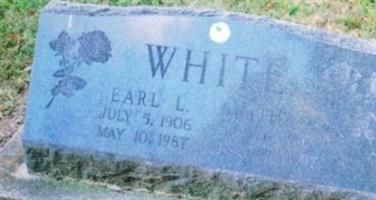 Earl L White