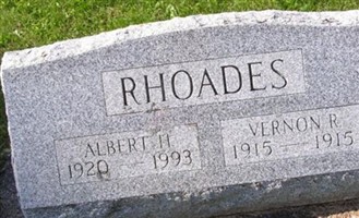 Albert H Rhoades