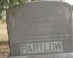 C. H. Partlow