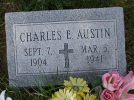 Charles E. Austin Charles E. Austin