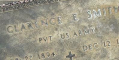 Clarence E Smith