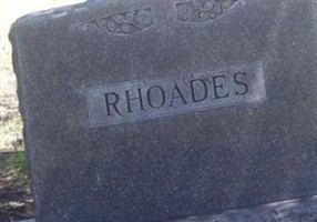 Claude M. Rhoades Claude M. Rhoades