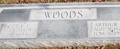 Cora J Woods