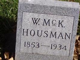 Dr William McK Housman