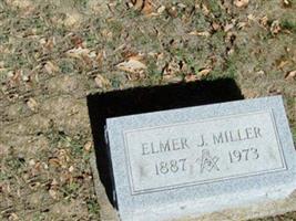 Elmer J Miller