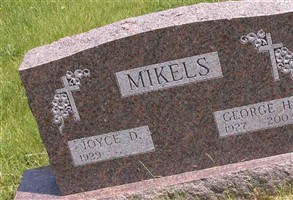 George H. Mikels George H. Mikels