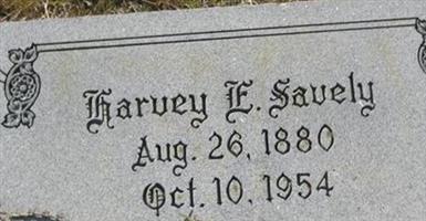 Harvey E Savely