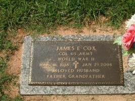 James E Cox