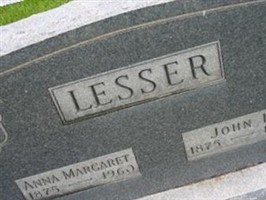 John D Lesser