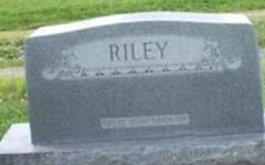 John E Riley