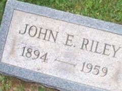 John E Riley