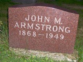 John M Armstrong