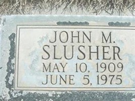 John M. Slusher John M. Slusher
