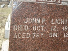John P Light