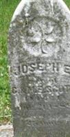 Joseph E Scott