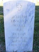 Joseph E Wells