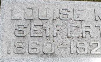 Louise M Seifert