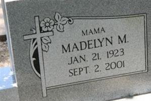 Madelyn M Olson