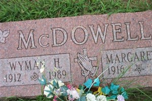 Margaret E McDOWELL