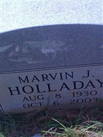 Marvin J Holladay