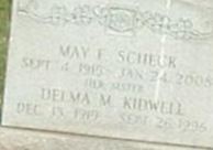 May F. Scheck