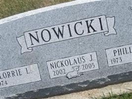 Nickolaus J Nowicki